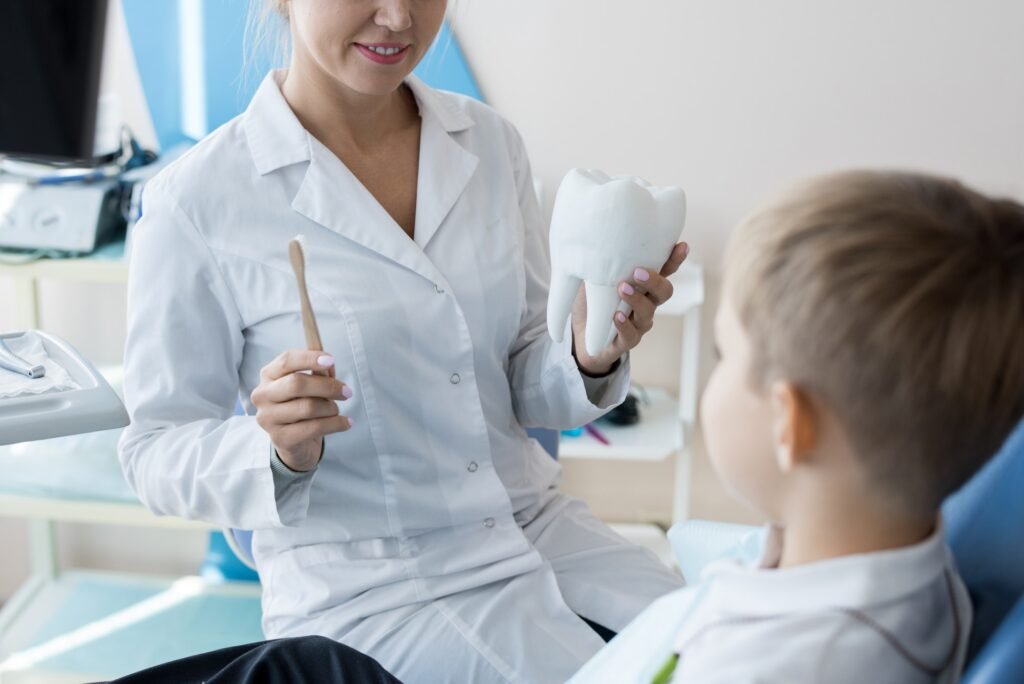 Dentist Explaining Dental Care to Child
