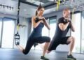 Couple working out with weights