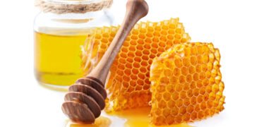 Honeycomb with honey in closeup