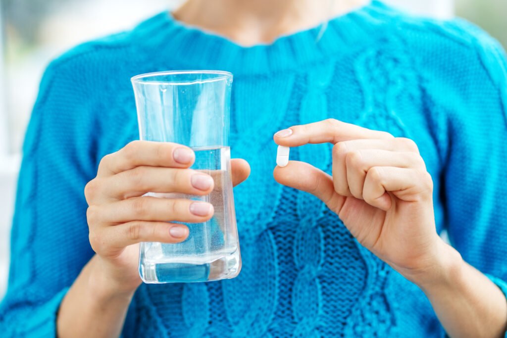 Receiving vitamins. Concept illness, colds, cure, fall and winte