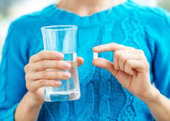 Receiving vitamins. Concept illness, colds, cure, fall and winte