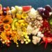 sliced fruits on black plate